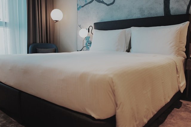 A double bed in a bedroom